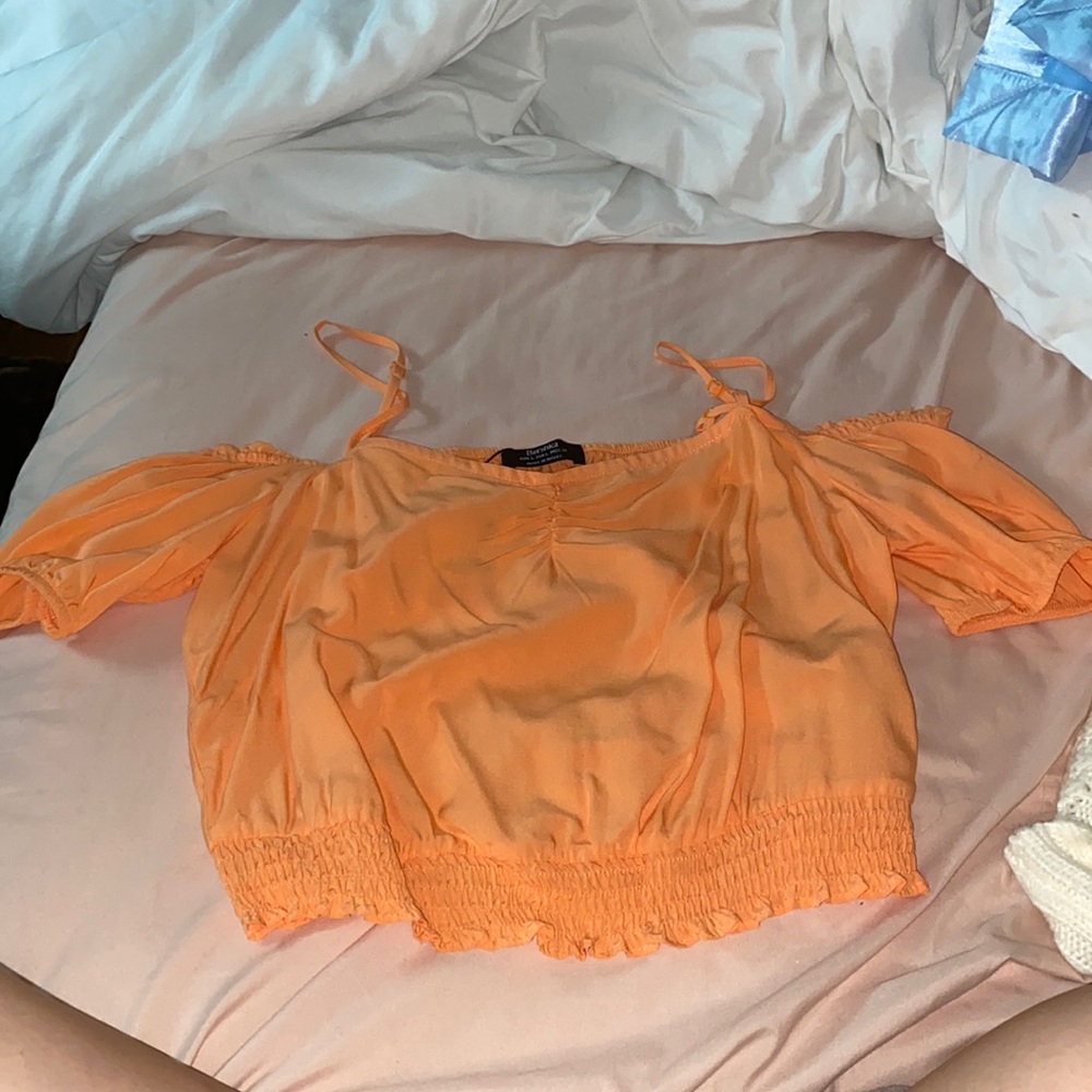 Cute orange shirt.